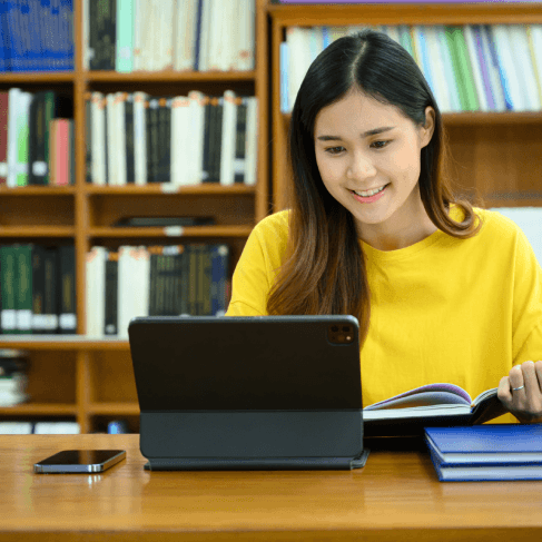 A student checks a transcript draft using Chinese Translation Services in Pennsylvania to match academic course titles.