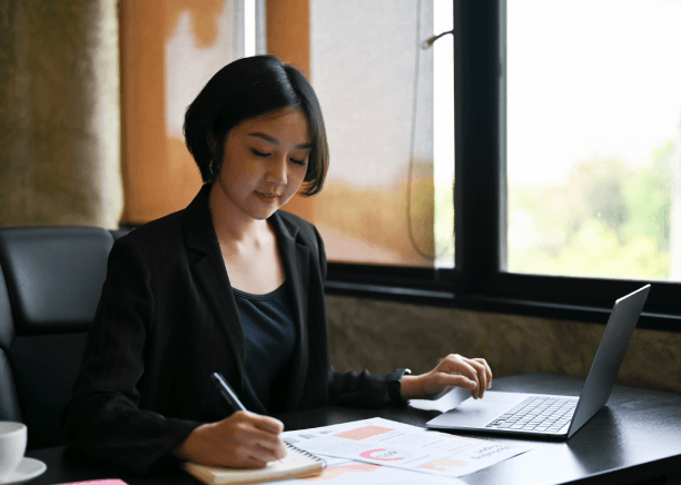 A client compares a Vietnamese bank statement and its English version, using Vietnamese Translation Services in Pennsylvania.