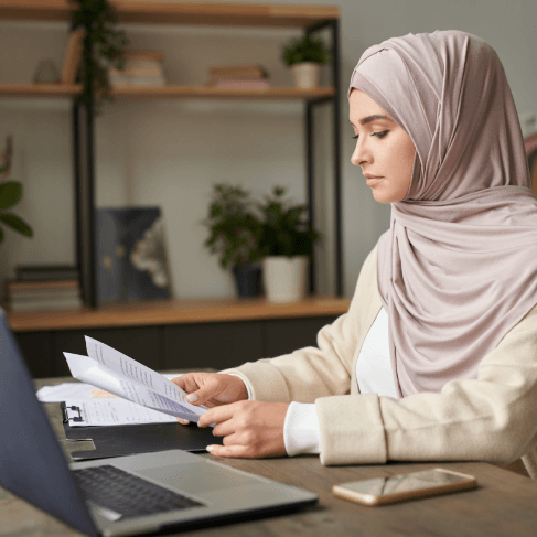 A client reviews a certified letter translation, using Arabic Translation Services in Pennsylvania for an individual.