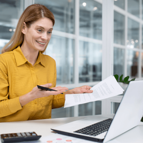 A manager reviews a certified contract packet, using Russian Translation Services in Pennsylvania for business partners.