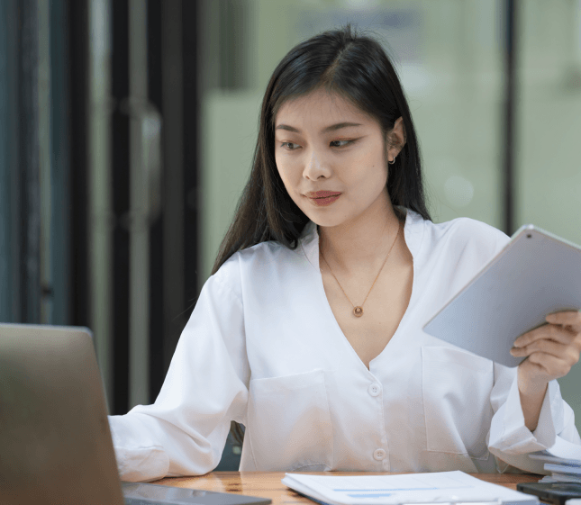 A client completes a free quote form while Chinese Translation Services in Pennsylvania prepare certified USCIS documents.