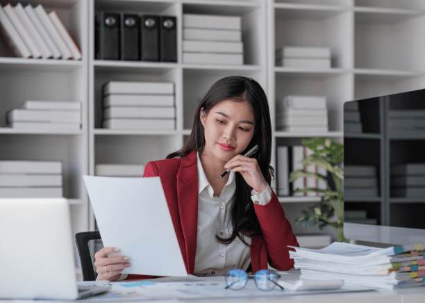 A translator reviews a real estate purchase contract, delivering Spanish Translation Services in Pennsylvania for closing.